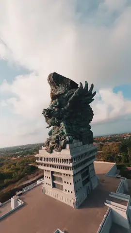 Did someone say cinematic masterpiece? 🎥✨  This drone shot of the Garuda Wisnu Kencana statue in Garuda Wisnu Kencana Cultural Park, Bali is completely, absolutely, utterly insane! You won't believe your eyes! 📸💥  📍GWK Cultural Park, Bali 📽️ cr/ig @thankyou.rogers #WonderfulJourney #WonderfulIndonesia #BaliViews #TravelGoals #EpicShot