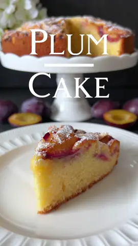 Plum Cake Recipe 🤍 This Plum Cake is moist and delicious, combining the sweetness of plums with a soft, buttery batter.🥰 📝  Ingredients: - 500 g plums, pitted and sliced - 150 g all-purpose flour - 100 g sugar - 100 g butter, softened - 2 eggs (size M) - 1 tsp vanilla extract - 1 tsp baking powder - 1 pinch of salt - 50 ml milk - Blanched, slivered almonds (a small amount for topping) - Powdered sugar for dusting 🤍   Instructions: 1. Preheat the oven to 180°C (350°F). Grease a 20 cm (8-inch) round baking tin and dust it with flour or line it with parchment paper. 2. In a large bowl, cream together the softened butter and sugar until light and fluffy. Add the eggs one at a time, beating well after each addition. Stir in the vanilla extract. 3. In a separate bowl, whisk together the flour, baking powder, and salt. Gradually add the flour mixture to the butter mixture alternately with the milk, mixing until smooth and well combined. 4. Pour the batter into the prepared baking tin and smooth the surface. 5. Arrange the sliced plums, cut side up, closely on top of the batter, gently pressing them in. Sprinkle the top with a small amount of slivered almonds. 6. Bake in the preheated oven for about 45-50 minutes, or until the cake is golden brown and a toothpick inserted into the center comes out clean. 7. Remove the cake from the oven and let it cool in the tin for about 10 minutes. Then transfer it to a wire rack to cool completely. 8. Before serving, dust the cake with powdered sugar. Enjoy this delicious Plum Cake! It is perfect for a coffee table or as a sweet dessert. Bon appétit! 🤍