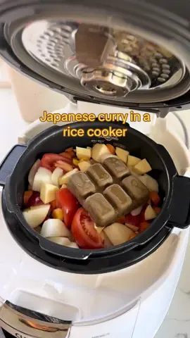 Japanese style curry in a rice cooker…🤯 My husband was so confused when I opened the lid and it was filled with curry. 😂 Recipe IB: @KIRBY | travel + food blogger and OMG I will never make curry without tomatoes ever again. Ingredients: * 1 onion * 3 large tomatoes * 1 apple * Handful of carrots * 1 sweet potato * 1 pack ground beef * 1 pack Japanese style curry cubes * 1 cup water Steps: 1. Rough chop all the veggies. 2. Add ground beef to the rice cooker along with the chopped veggies, Japanese style curry cubes, and water. 3. Cook in the rice cooker as you would cook regular rice (~30 minutes). 4. Stir and mush together until everything is well combined. 5. Garnish with green onions and serve with fukujinzuke (pickled veggie condiment). #easymeals #healthymeals #nutritiousmeals #mealideas #familymeals #cookwithme #cookingmama #ricecookerrecipe #ricecooker 