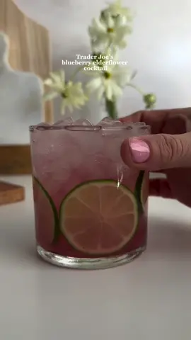 Trader Joe's blueberry elderflower cocktail brings the taste of summer sweetness right to your home 💙 @ashleytassano Recipe: 2 oz vodka 1.5 oz Trader Joe’s lemonade 2 oz blueberry elderflower beverage Fresh lime juice Top with sparkling water #Traderjoes #Cocktails #Trendingcocktails #Drinkideas 