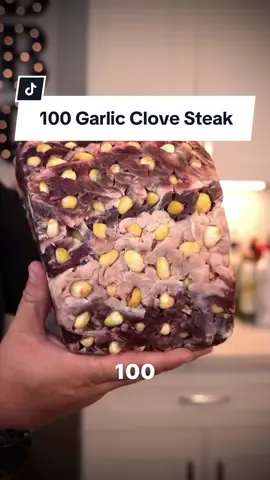 100 Garlic Clove Prime Rib 🧄🥩 I watched a 50 Garlic Clove Fried Chicken on @JortsKitchen | Recipes channel and it got me thinking 🤔 I’m a garlic girl! Recipe says 2 cloves you know I’m adding 12! 🧄🫶 Ingredients:  1 Prime Rib Roast 100 Peeled Garlic Cloves  Rosemary  Salt Chives  A1 Steak Sauce 🤣 How to:  1. Salt the steak and leave in the fridge uncovered for 2-3 days 2. On cook day take out of the fridge and poke 100 X slits with a thin knife to insert your garlic cloves 3. Add Prime Rib to a Food Saver bag with Rosemary and seal 4. In a Sous Vide set to 115 degrees and cook for 4 hours 5. Pull out and Sear on all sides up to 225 degrees internal  6. Rest for 15 minutes and slice your masterpiece  7. Add your favorite steak sauce and top with chives 8. Enjoy you Garlic Girl 🧄🫶 #garlic #girl #prime #rib #roast #Recipe 