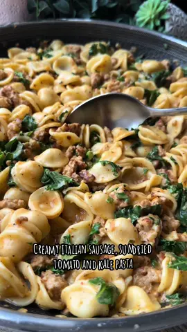 Creamy Italian sausage, sun dried tomato and kale pasta  . ⬇️ Recipe below ⬇️ . Recipe serves 4   . Press save for dinner inspiration 📌 follow @dinner_at_hols for more recipes like this 🫶🏼 . Ingredients.  . 300g pasta- i used orecchiette but any pasta will work fine.  400g sausages, chopped 1tbs Italian mixed herbs  1 onion (finely diced)  3 cloves garlic (finely grated) 1tbs tomato puree  2tbs sun dried tomato paste  200ml chicken stock  120ml single cream  2tsp dried oregano  Full bag of kale, chopped  Chilli flakes and parsley to garnish (optional)  . . Method. .                 1.             Pop your pasta onto boil with plenty of salt.                  2.             Fry off the sausages and the Italian mixed herbs until brown, then add in the onion and cook until the onion is soft.                  3.             Then add the garlic, tomato puree and sun-dried tomato paste and cook for a minute or so.                  4.             Add in the stock and cream. Cook for a couple of minutes until it’s thickened.                 5.             Add in the chopped kale and then the cooked pasta and cook for 2-3 minutes until the kale is cooked and the pasta is coated in the sauce, adding a little pasta water if needed.                  6.             Garnish, Serve and enjoy.  . . . Calories- 491 Protein- 24.5g  . #fyp #fypシ #viral 