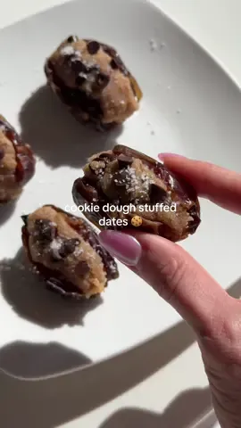 Replying to @amandafxo healthier “cookie dough” stuffed dates 🍪✨ I can't stop making these they are UNREAL for the cookie dough: - 1/2 cup almond or oat flour - 1 tbsp nut butter - 1 tbsp maple syrup - splash of vanilla extract - pinch of salt mix & add chocolate chips, then add to a medjool date! #healthydessert #dessert 
