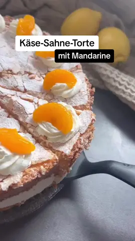 Käse - Sahne - Torte mit Mandarine .  5 Eier 150g Zucker  1 Pck. Vz 2-3 Tröpfchen Zitronenextrakt 1 Prise Salz 100g Mehl 3 EL Stärke  Für die Käse - Sahne - Schicht  2 kleine Dosen Mandarine  5 Blatt Gelatine 60g Zucker 1/2 ausgepresste Zitrone 500g Magerquark 700g Sahne  Die Eier mit Zucker, VZ und Zitronenabrieb aufschlagen. Die Masse sollte dickflüssiger werden. Anschließend das Mehl und die Stärke sieben und unterheben. Den Teig in eine Springform gießen. (Durchmesser 28cm)  Bei 160 Grad Umluft im vorgeheizten Backofen ca. 20 Minuten backen.  Den Kuchen auskühlen lassen und in der Mitte halbieren.  Die Sahne steif schlagen und ca. 200g Sahne davon in einen Spritzbeutel füllen und kalt stellen. Den ersten Boden auf eine Tortenplatte legen und einen Tortenring um den Boden stellen. Gelatine in kalten Wasser auflösen. Saft der Mandarinen auffangen und gut 3/4 in einen Topf gießen. Zucker und ausgepresste Zitrone hinzugeben und aufkochen lassen. Hitze runtersetzen und Gelatine darin auflösen lassen. Löffelweise den Quark unterrühren. Die Mandarinen auf den Tortenboden legen, 12 Mandarinen zur Deko zurückhalten.  Die Sahne unter die Quarkmasse heben und auf den Boden geben. Am nächsten Tag, den Tortenboden in 12 gleichmäßige Stücke schneiden. Den Tortenring entfernen. Und die Stücke einzeln auf die Quarkmasse legen. Etwas Sahne aus dem Spritzbeutel hauchdünn auf den Boden verteilen. Und anschließend nochmal einzeichnen, jetzt auf jetzt Stück einen Sahnetupfer spritzen und eine Mandarine darauflegen.  .  #lecker #leckeressen #backen #backenmitliebe #backenmachtglücklich #backenmussmitliebesein #gebacken #baking #bakery #baker #bakerlife #bakerrecipes #bakingrecipe #bakingrecipes #Recipe #recipes #recipeslover #yummy #yummyfood #yummyrecipes #yummyrecipe #recipesoftiktok #recipesforyou #recipevideo #recipeoftheday #recipeoftheweek #recipeoflove #rezepte #rezept #rezeptliebe #rezeptderwoche #rezeptdestages #viral #viralvideo #viralvideos #virales #Foodie #foodies #FoodLover #foodlovers #foodlove #foodhacks #foodheaven #foodblogger #foodblog #foodphotography #foodphoto #FoodTok #FoodLover #foodloverforever #foodlicious #delicious #deliciousfood #soulfood #torten #torte #tortenliebe #tortenrezepte #tortenrezept #cake #cakedcorating #cakes #cakelife #cakelover #cakelovers #kuchen #kuchenliebe #kuchentraum #käsesahnetorte #mandarine #eat #eating #eatingshow #eatingsounds #sonntag #sunday #kaffeeliebe #kaffeeklatsch #kaffeeundkuchen #genuss #schmeckt #schmecktgut #schmecktlecker #leckerchen #leckererezepte #fyp #fypage #fyp #foryou #foryoulove 