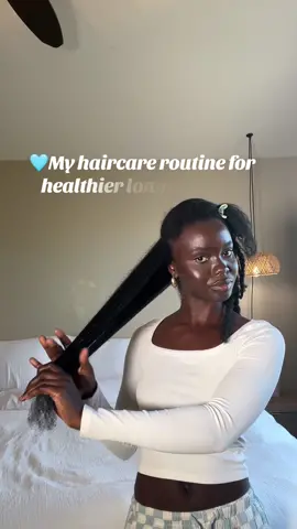 Let’s do my hair care routine together🩵🤍@KCurlsys  1. Set a relaxing atmosphere before you attempt to do your hair. This really informs your behavior and how you will treat your hair. The more relaxed you are, the more gentle you will be with your hair. 2. Using @kcurlsys deep conditioning smoothie first, I soften the dirt, lint and product buildup at the roots of my hair for easy takedown.  3. Separate your hair to remove any shed hair. Cut stringy ends before heading into the shower. If you do not do this, it will create more tangles while shampooing which may increase the chances of breakage during detangling. 4. I double cleanse my hair or use a detox shampoo 5. Deep condition hair fully to strengthen the protein bonds in your hair that may have been weekend from manipulation, wears and tears, or not treating your hair while in protective styling. 6. Use a microfiber hair towel to dry your hair, !! PLEASE!! Because they are highly absorbent, they cut down drying time in half. Without this, your opened hair cuticles become saturated with water and, swell thus weakening the hair. 7. Moisturize the hair with a leave in conditioner or strengthening serum and then add an oil to seal moisture.  #haircare #HairCareTips #4chair #hairgrowthtips 
