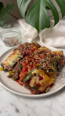 PAELLA STUFFED SILVER BEET ROLLS Throwing back to this one from last year. A blend of tradition and creativity to try. Perfect comfort food dinner, so simple and so good.  Save the recipe below and let me know in the comments you’re going to make it🙌 Ingredients: Makes 12 large rolls For the Rolls: 1 whole silver beet 1 1/2 cup tomato sauce 1/2 cup shedded cheese For the Paella: 1 tablespoon olive oil small brown onion, finely shopped small red pepper, finely chopped en 1 cup mushroom cups, chopped 1 small broccoli head, cut into florets and chopped 1 teaspoon smoked paprika  1 teaspoon oregano 1/2 teaspoon garlic powder (optional) 1 teaspoon saffron powder (see notes below) 1 cup bomba rice or arborio rice 1 cup frozen green peas  2 cups water or vegetable stock Method: In a large pan heat olive oil over medium heat. Add onions and cook for 3-5 minutes. Add peppers, mushrooms, broccoli and spices. Give it a toss and cook for another 5 to 7 minutes. Add rice and stir everything together, cook for another minute. Add in frozen peas and water/vegetable stock. Gently stir and bring to a boil. Once boiling, reduce the heat to a low and cover the pan. Simmer for 20 minutes undisturbed. Give the rice a taste after 20 minutes, if it’s tender, switch the heat off. Bring a large pot of water to a boil. Trim the white base of the silver beet and tear out 12 leaves. Place the leaves in the boiling water for 7 minutes or until they have wilted. Drain the leaves and let them cool down. Lay out the leaves on a working surface and spoon tablespoons of the paella onto the base of each leaf. Roll them tightly, tucking in the sides to enclose the filling and place into a greased baking dish. Pour over tomato sauce and sprinkle with cheese. Pop in the oven at 180C for 15-20 minutes or until the cheese has melted and the top is crispy brown. Serve warm, enjoy right away and follow for more recipes. #vegan #veganfood #paella #rice #friedrice #healthyfood #healthymeals #healthydinner #healthyeating #comfortfood
