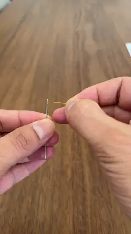 Struggling with threading a needle? This hack will save you some hassle! 🧵✨  #LifeHacks #Crafting #SewingHacks #NeedleThreading #homehacks  sewing hack, needle threading, DIY, life hacks, easy sewing tips, sewing made easy, crafting hacks, needle threading trick, home