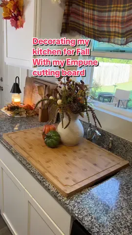 #ad This cutting board is extra large in size!! Its such a great functional kitchen accessory for cutting fruits and veggies or even creating more counter space. It is 100% bamboo and looks so pretty in my Kitchen with my Fall home decor. #empune #bamboocuttingboard #kitchenmusthaves #cuttingboard #fallkitchendecor #fallkitchenvibes #fallkitchen #fallhomedecor #fallaesthetic #autumnaesthetic #kitchen #KitchenHacks #falldecorideas #cozyfallvibes #DealsForYouDays #treasurefinds #TikTokShopBackToSchool 