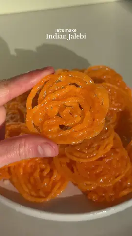 VEGAN INDIAN JALEBI - @Eitan Bernath showed me how to make jalebi for the first time, and guyssss, it’s seriously one of the best treats I’ve ever had!  These crispy, syrupy spirals are way easier to make than you might think. They start with a simple batter that ferments overnight, then get fried and soaked in a delicious sugar syrup. Told ya it was simple! Check out the full vegan recipe on my blog at itsvegansis.com (link in my profile)! #jalebi #indianrecipes #indianfood #indiansnacks 