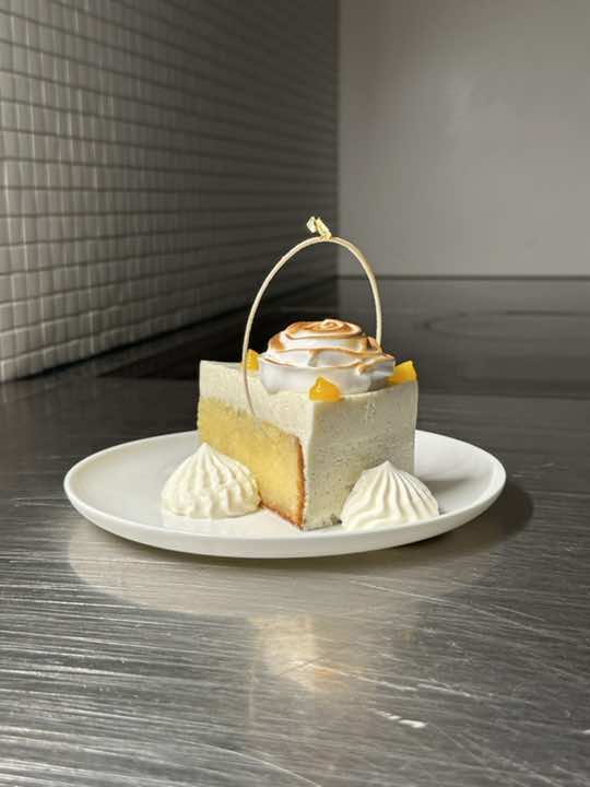 Where do you want your slice of heaven? #lemon #cake #dessert  Lemon Yoghurt double-layered cake soaked in vanilla bean and citrus syrup, fresh whipped cream, lemon curd. Taste 9/10  This is an incredibly rich yet fluff lemon cake with a lovely freshness from the vanilla citrus syrup. The yoghurt balances the cake with its creaminess but subtle tanginess.  Visuals? I'm still trying to figure it out; please let me know.  Lemon Curd Recipe: - 4 egg yolks - 50g butter - 100g caster sugar - 80g lemon juice (and zest) - vanilla seeds Recipe soon on my website with complete explanations, including easy and more challenging.
