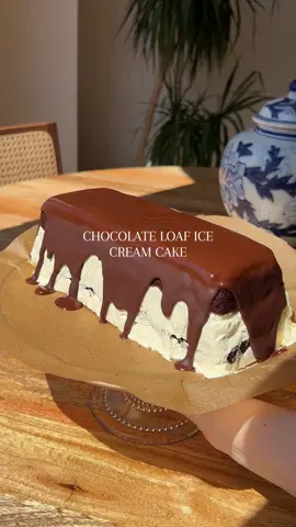 Chocolate loaf ice cream cake A labour of love but for good reason, this is the perfect recipe for a hot sunny day!! Ingredients 170g / 3/4 cup softened butter 175g / 3/4 cup caster sugar 3 eggs 175g / 1.1 cups self-raising flour ½ tsp baking powder 1 tsp vanilla extract  50g / 0.45 cup cocoa powder 50g / 0.3 cup dark chocolate chunks 310g / 1 cup double/ heavy cream 80g/ 1/3 cup condensed milk  1/4 tsp vanilla bean paste  200g / 1.1 cups melted chocolate 1 tsp coconut oil Instructions Heat the oven to 160C/ 350F. Line a loaf tin with baking paper, leaving the ends hanging over. Cream together the butter, sugar + vanilla extract with a standing mixer (paddle attachment) until pale. Then add the eggs and beat on medium speed for a couple of minutes. Don’t worry if it looks split. Fold in the flour, baking powder and cocoa. Add the chocolate chunks and combine. Scrape the batter into the tin and bake for 45-55 minutes or until a skewer inserted into the middle comes out clean. Leave to cool.  Make your ice cream by electrically whisking cream with condensed milk and vanilla paste. I whipped until stiff peaks because I wanted it to stay firm even when its not frozen but if you want your ice cream to be more melty, whip it to only soft peaks.  Cut the top off your loaf (discard / eat this!) and then cut the remainder in half. Return one half back to the loaf tin and spoon/ pour half the ice cream on top. Add the other loaf half and the rest of the ice cream. Freeze for a minimum of 5 hours. Remove from the freezer and flip, drizzle with chocolate (melted with the 1 tsp coconut oil) and then slice it up! If you kept your ice cream softer, you will need to keep this stored in the freezer. Enjoy! #icecreamcake #icecream #summerrecipes #chocolatecake #loafcake #icecreamtime #vanilla #whippedcream 