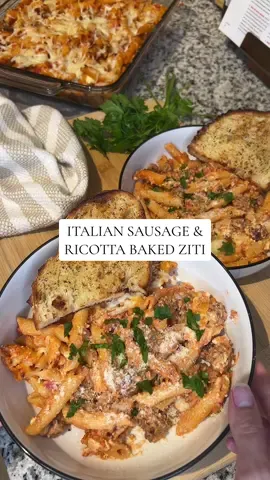 Comfort food will always have my heart and this baked ziti is no exception 😍🤌🏻🍝 (it’s actually baked penne because I didn’t have ziti noodles 🤫) I love to make this on a cozy Sunday! It makes a big ol’ pan so we usually pop it back in the oven and eat it a 2nd day. I also think this would be a great dish for hosting 🥰 Ingredients: - 1 onion - 1 lb ground italian sausags - garlic - italian seasoning - red pepper flakes - salt & pepper - 1 box (12 oz) ziti noodles - 28oz crushed tomatoes - 1 cup heavy whipping cream - pinch of sugar - 8oz ricotta cheese - shredded mozzarella - grated parmesan Instructions: - preheat oven to 375° - dice onion - heat a large pan on medium heat and cook italian sausage with onion and garlic - season with italian seasoning, red pepper flakes, and salt & pepper - while sausage is cooking, boil noodles for 4-5 minutes - mix crushed tomatoes and heavy cream in the pan with the italian sausage and heat through - sprinkle with a pinch of sugar - mix noodles into meat mixture - in a 9x13 baking dish, spread half of the pasta mixture in an even layer - spoon the ricotta in dollops over the first pasta layer - top with remaining half of pasta mixture - sprinkle mozzarella cheese and grated parmesan over top - bake for 20ish minutes #dinner #DinnerIdeas #dinnerinspo #dinnerrecipe #dinneridea #comfortfood #weeknightdinner #easydinner #easydinnerideas #bakedziti 