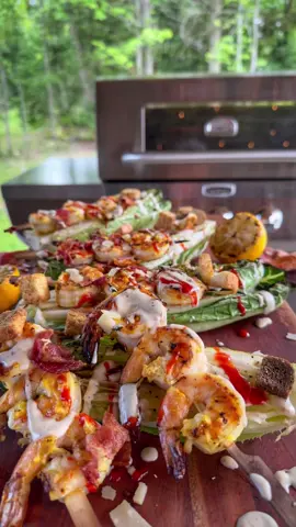 Grilled Caesar Shrimp Skewers on Grilled Romaine Salad! 🦐 🔥 Marinate shrimp in an inspired Caesar dressing for a burst of flavor. A delicious and funky twist on the classic Caesar salad!   Everything's grilled to perfection on my Five-Burner @Cuisinart Outdoors Dual Fuel Gas Grill!   #cuisinartoutdoors_partner 