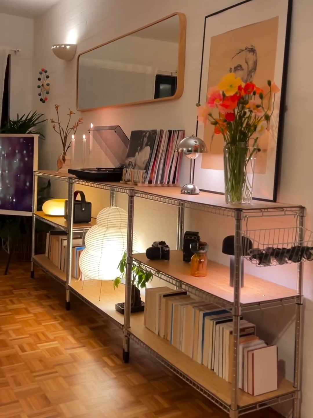 OMAR shelving unit + the iconic VARMBLIXT LED lamp = the ultimate cosy corner 🍩💡  IG: @coincidentallyus