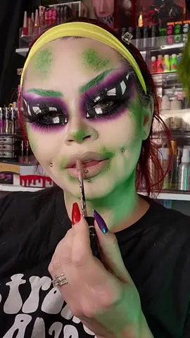 Beetlejuice witch *repost from last Halloween season* 🧙🏻‍♀️💚🪳 I'm gonna be reposting a few looks until September's Glam-O-Ween series starts 👻 @Beetlejuice  • 👻 Wig @powderroomd 👻 Costume @funcostumes • Link in my bio for a discount! 👻 RIP earrings @witchwoodbags • 💚 @plouise_makeup_academy 0.5 Base • Discount code 