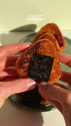 SPICY EDAMAE YAKI ONIGIRI🍙 For the full recipe head to itsvegansis.com - link in bio! Yaki Onigiri – seriously, one of my favorite Japanese snacks! Grilled rice balls stuffed with a spicy edamame filling with just the right amount of heat🔥 You get the perfect mix of crunch, chewiness, and flavor in every bite. Honestly, what more could you want from a snack?! #japanesefood #japanese #snacks #onigiri #spicy 