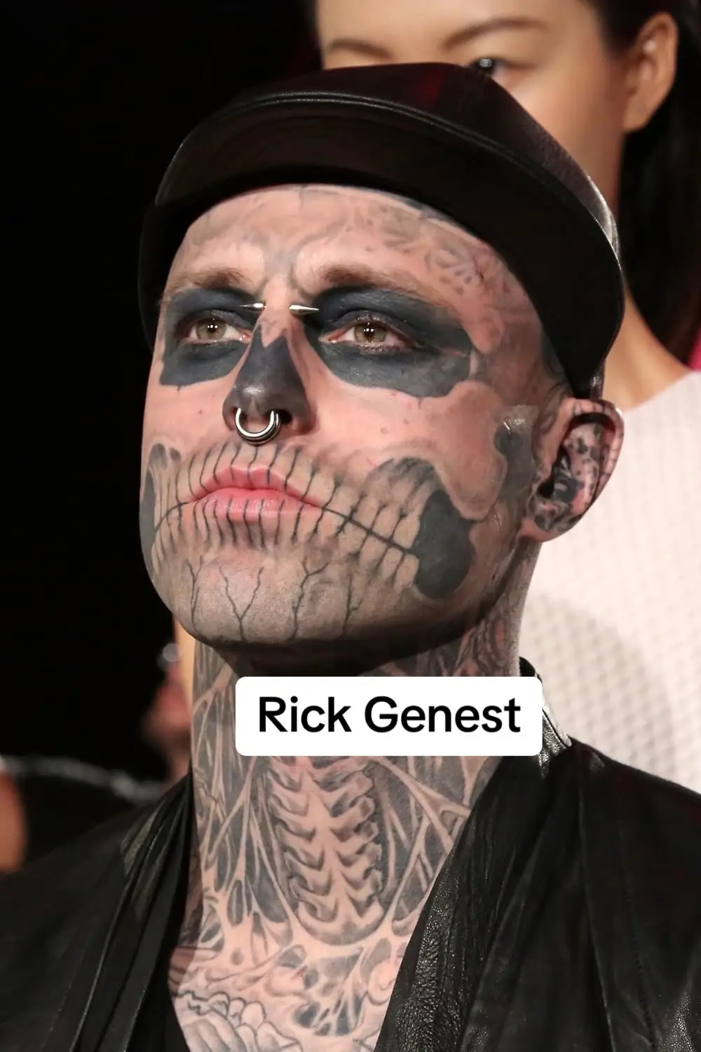 Rick Genest also known as Zombie Boy, was a Canadian artist, actor, fashion model, and musician. He held a Guinness World Record for his full-body tattoos. Genest was born in LaSalle, Quebec, and grew up in Châteauguay.At 15,Genest was told he had a brain tumor. Genest had himself tattooed over approximately 90% of his body and held the Guinness World Record for the most tattoos of human bones (139). He previously held the Guinness World Record for most tattoos of insects (176 Tattooed as a living skeleton, Genest worked in various sideshows and freak shows across Canada as an illustrated man, eventually starring in his own show, called Lucifer’s Blasphemous Mad Macabre Torture Carnival. Not long after beginning his facial tattoos, Genest was first introduced to the public on November 13, 2006, in a blog post on Body Modification Ezine (BME)'s ModBlog The introductions on RzyM's Channel led to increasingly mainstream media coverage, notably a June 2008 feature in Bizarre magazine. In the 2009 television film Carny, starring Lou Diamond Phillips as a small-town sheriff, Genest was seen as a Tattooed Man at the Carnival.  In January 2011, Genest was featured in the new Thierry Mugler Autumn/Winter men's collection, headlining it on the brand's website, after his discovery by Formichetti, who was Mugler's creative director In February 2011, Genest was featured in Lady Gaga's music video for 