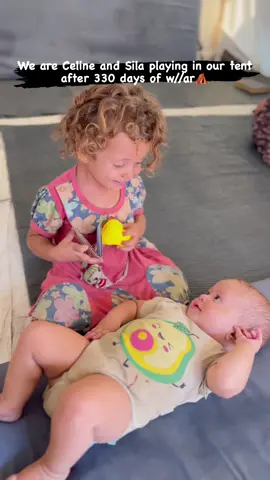 We are Celine and Sila playing in our tent after 330 days of w//ar⛺️ Sharing and visit my bio 🔗