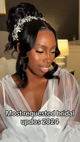 Soft bridal updos are trending this year and im so happy. So honored to have slayed these brides. #bridalupdo #bridalhairstylist #bridalhair #blackbride #blackbridalhair #weddinghair #updo 