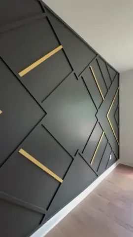 Transforming spaces one wall at a time! 🖤✨ This geometric design, featuring Sherwin-Williams Iron Ore, is elevated by stunning pops of gold that bring a perfect balance of boldness and elegance. The contrast between the deep, rich Iron Ore and the luxurious gold accents makes this design truly stand out, turning any room into a sophisticated masterpiece. #AccentWall #GeometricDesign #SherwinWilliams #IronOre #GoldAccents #HomeDecor #InteriorDesign #TheBoardroomAccentWalls #WallDesign #moderninteriors 