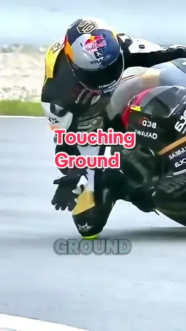 Why MotoGP Riders Touch The Corner? MotoGP riders touch the corner’s surface to see if their hand glides smoothly or vibrates. This allows them to assess whether the surface is slick, which would make it too risky to ride over the curb or use it as a knee rest for faster cornering. Credits:  @ motogp / YT #Tech #technology #engineering #innovative #fyp