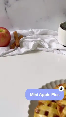 Mini apple pies  Ingredients: -2x apples (peeled and chopped into small cubes) -40g salted butter  -50g brown sugar -1-2 tsp cinnamon -1/4 tsp nutmeg -2 tbsp lemon juice  -1/2 tsp cornflour   -3 tsp cold water -2x sheets frozen shortcrust pastry -1x egg (whisked) Method: -Simmer chopped apples, salted butter, brown sugar, cinnamon, nutmeg and lemon juice in a saucepan until the apple have mostly softened. -Mix together cornflour and cold water. -Pour the cornflour slurry into the simmering apples. Mix until thickened then set aside to cool. -Preheat oven to 180C. -Use a round cookie cutter or a glass to cut out rounds in one of the pastry sheets (I made 9). -Use the second sheet of pastry to cut out strips (approx. 1.5cm). -Place approx 1 tbsp of the filling into the centre of each round.  -Lay 2 parallel strips of pastry on top of each round, then lay 2 more strips perpendicular to the first to create a lattice. -Cut off any excess pastry on the rounds and use a fork to seal the edges. -Brush the pastry with the whisked egg. -Bake at 180C for 20-25 minutes or golden brown.  Happy Baking! #miniapplepies #applepie #applepiecookies #baking #easydessert 