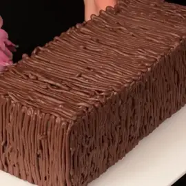 Delicious Chocolate 🍫 Dessert 🍰 preparation take a saucepan cocoa powder 30g sugar 30g stir well milk 120ml  stir well boil on low heat add 30g butter stir well remove from the heat take a bowl crushed biscuits 200g chopped dried plums 80g add the boiled chocolate stir well  mold size 24 x 10.5cm x7cm high add the biscuits into mold  refrigerator for 40min take a saucepan milk 200ml sweet condensed milk 80g stir well gelatin powder 3g stir well boil on low heat after boiling  cook for 3min add the chocolate into mold  cover the mold refrigerator for 60min take a saucepan milk 200ml sweet condensed milk 80g  stir well gelatin powder 3g stir well boil on low heat add 30g chopped sweet chocolate after boiling cook for 3min add the liquid into mold cover the mold refrigerator for 5hours Chocolate for the top take a bowl  chopped dark chocolate 100g  softened butter 10g melt on hot water warm whipped cream 100ml stir well take a plate take the dessert out  from the mold decorate whit the chocolate refrigerator for 2 hours #chocolate #foryou #sweet #dessert 
