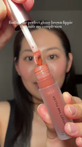 leaning into brown glosses more because that's what tends to go best with my lips and complexion  @lawless forget the filler in maple sugar 🤎 this formula is so good - plumping, but not too spicy! I can see why it's called forget the filler because it fills out all of those fine lines on my lips and just plumps them up!  a glossy lip just ties the whole look together and I feel so much more put together with this shade on  what's been a lippie you can't put down?  #lippie #gloss #glossylips #brown #lipfiller #plumpinglipgloss 