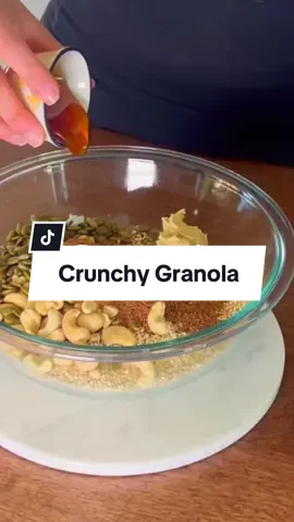 What’s your favorite granola? I’m making a super crunch granola and it’s so simple! Start with 2 cups of oats and 1 cup of quinoa—this unexpected ingredient gives it that perfect crunch. Add some pepitas for color and then mix with cashew butter, a little coconut sugar (just enough for flavor, sugar is still sugar), and honey. Bake it low and slow at 250°F for 1 hour to get that perfect crunchy texture. You can even toss in dried fruits or coconut flakes after! Who’s ready to try this? Want the homemade cashew butter recipe? Let me know! #extracrunchgranola #homemadegranola #quickbreakfast 
