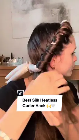 We love this Silk Heatless Curler hack by @Chloe 🤍    Skip the heat and style your hair using our Silk Curlers. Made from the highest grade of mulberry silk fabric, this luxury heatless curler will give you a bouncy blow dry at home! Giving no damage to your hair after using ZERO heat, preventing breakage and eliminating frizz.  How to use ✨ On slightly damp hair, secure the curler onto the head with our chic matte clip and take sections of hair and wrap around the curler. Secure with your silk scrunchie and repeat on the other side. Wait 4+ hours (or sleep in it!) and remove for effortless, heatless curls.  Pair with one dose of Dose 1.0 Hair Oil for best results.  Contains: Mulberry Silk Curler  2 x Mulberry Silk Scrunchies   Claw Clip REHAB Bag #tiktokmademebuyit #REHAB #REHAByourhair #hairtok #haircare #heatlesscurls 