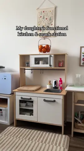 She loves this space! #montessori #montessorispaces #montessorikitchen #functionalkitchen #toddlerkitchen #snackstation #foodprepstation #foodprep #practicallife #practicallifeskills #montessorichild #montessoritoddler #montessorihome #toddlerkitchen #toddlersoftiktok #toddlerfunctionalkitchen #playkitchen #toddlerplaykitchen 