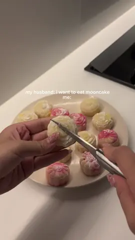 made snowskin custard mooncakes for my husband 🥮 happy mid autumn!! ⁣⁣ ⁣⁣ #cookwithme #BakeWithMe #mooncakerecipe #midautumn #dessert  ⁣ ⁣⁣ Snowskin: ⁣⁣ - 50g glutinous rice flour ⁣⁣ - 50g rice flour ⁣⁣ - 25g corn flour / corn starch ⁣⁣ - 25g sugar ⁣⁣ - 185g milk ⁣⁣ - 25g condensed milk ⁣⁣ ⁣⁣ Combine all the ingredients above in a bowl and hand whisk till smooth. Steam the bowl for 25 minutes in a closed pot. ⁣⁣ ⁣⁣ While it’s steaming, start making the custard filling. ⁣⁣ ⁣⁣ Custard Filling:⁣⁣ - 60g milk powder ⁣⁣ - 35g corn flour / corn starch ⁣⁣ - 120g milk ⁣⁣ - 60g sugar ⁣⁣ - 50g butter ⁣⁣ - 3 eggs ⁣⁣ ⁣⁣ Add the milk powder, corn flour, milk and sugar in a bowl and mix till combined. Then add the butter and 3 eggs. Whisk the mixture till smooth. ⁣⁣ ⁣⁣ In a pan on low heat, pour the custard mixture and stir regularly. Once it becomes lumped together and no longer liquid, pour it into a bowl and set aside. ⁣⁣ ⁣⁣ Making the mixture: ⁣⁣ ⁣⁣ Once the snowskin bowl is done steaming, cut into hardened mixture and score it into small squares. ⁣⁣ ⁣⁣ Add about 25g of butter and let it seep into the mixture. ⁣⁣ ⁣⁣ Once done, transfer the snowskin mixture into a bowl and knead it until combined and smooth. Shape it into a ball and set aside. ⁣⁣ ⁣⁣ Using a weighing scale, measure out 20g of snowskin mixture for each mooncake and shape it into a ball.⁣⁣ ⁣⁣ Measure out 15-20g of custard filling for each mooncake and shape it into a ball. ⁣⁣ ⁣⁣ Assembling the mooncake: ⁣⁣ ⁣⁣ With floured hands, flatten out one 20g snowskin ball before adding the custard ball in the middle. Close the snowskin around the custard filling and shape it smooth. ⁣⁣ ⁣⁣ Coat the combined mooncake ball in flour (you can use cooked glutinous rice flour for this) before putting it under the mooncake moulder. Press down using the moulder and form your mooncake! ⁣⁣ ⁣⁣ To get coloured mooncake, have a separate bowl with food colouring and follow the same steps above. Once the mooncake ball is covered in flour, dip it into the coloured mixture before coating it flour and second time. Afterwards put it in the moulder and form your mooncake. ⁣⁣ ⁣⁣ Once done, store all the mooncakes in the fridge for a few hours before eating (the mixture needs time to combine).⁣⁣ ⁣ If the mooncakes have been in the fridge overnight, leave it on the counter for 30mins before serving.⁣ ⁣ (Recipe inspired by @Ms Shi & Mr He 🥮🫶🏻)