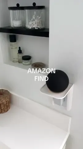 Free up some counter space with this outlet shelf holder. Holds an Amazon Echo Dot perfectly! On my storefront. #amazonfinds #amazonhome #techgadgets #homefinds #organization 