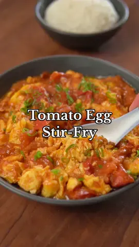 Tomato Egg Ingredients * 4 eggs * Salt to taste * Neutral oil * 2 scallions(sliced) * 3-4 tomatoes(cut into chunks) * 2 tbsp water * 1 tsp soy sauce * 2 tsp oyster sauce * 2 tsp sugar * 2 tbsp ketchup * 1/4 tsp white pepper * 1/4 tsp msg * 1 tsp sesame oil Instructions 1. Prep ingredients by slicing scallions and cutting tomatoes into chunks.  2. Whisk eggs and season with a pinch of salt.  3. Heat 3 tbsp of oil in a wok on medium high heat. Pour eggs and scramble and once the eggs are set but are still slightly runny, set it aside(30-45 seconds). 4. Add 2 tbsp oil to the same wok and sauté the white portion of scallions(30 seconds). 5. Once fragrant, add the tomatoes and a splash of water.  6. Let that simmer and once the tomatoes become soft and release their juices, add soy sauce, oyster sauce, sugar, ketchup, white pepper, and msg. 7. Let that simmer and once thickened, incorporate the scrambled eggs. 8. Finish with a little sesame oil and garnish with the green portion of scallions. #30minutemeals #tomatoegg #tomatoeggstir-fry #tomatoeggstirfry #Recipe #cooking #food #stir-fry #stirfry #recipevideo #cookingvideo #foodvideo #recipetutorial #cookingtutorial #EasyRecipe #EasyRecipes #easyrecipeideas #quickrecipe #quickrecipes #quickrecipeideas #tomato #egg #asianfood #comfortfood #cookingathome 