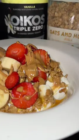 Greek yogurt bowl . I put Oikos greek yogurt , Oats & Honey Granola, Strawberries, organic bananas , Jif Creamy Peanut Butter & honey. #greekyogurt #yogurtbowl #healthyyogurtbowl #greek #yogurtparfait 