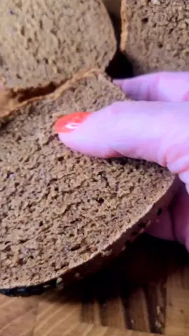 RUSSIAN BLACK BREAD  225g (1 3/4 cups) dark rye flour  225g (1 3/4 cups) bread flour  3 tablespoons dry malt powder (or liquid malt) 1 1/2 teaspoons active dry yeast  300 ml warm water  1 1/2 teaspoons salt 2 tablespoons Avocado oil  1 tablespoon dark honey Form dough and knead for 10 minutes.  First proof: 1 hour Second proof: 40 minutes  Third proof ( in the loaf pan) 25 minutes  Brush top with water. Sprinkle with sesame seeds. Bake at 425°F (220°C) for 40 minutes.  Cool, slice, and enjoy ! #reels__tiktok #capcut  #reels #videorecipe #Foodie #easytomake #breadbaking #blackbread #russianbread #черныйхлеб #ржанойхлеб #darkryebread #EasyRecipe