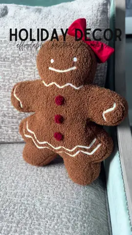 She is the cutest. Paying $70 for a pillow is WILD #gingerbread #gingerbreadhouse #christmas #christmasdecor #christmasdecorations #tiktokshop #foryou #throwpillows #christmascountdown 