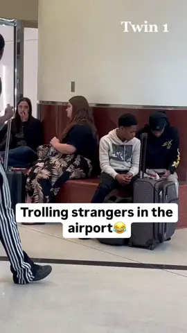 Twin prank on strangers at airport 😂#funny #humor #trolling #twins