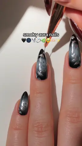 smoky aura nails! 🖤🌑🌿👀 i had never tried to do an aura design with gel before because i obviously didn’t want any gel to get on my skin, but using a tiny sponge to do the gradient is a complete game changer! <3 — using: • @kiaraskynails  black painting gel “Pitch Black” 🖤 white painting gel “Blank Slate” 🤍 silver painting gel “Silver Fox” 💍 glossy gel top coat  (use my code PAULAR10 for 10% off! 💸) #auranails #leafnails #autumnnails #silvernails #nailart #nailarttutorial #nailinspo #naildesign #diynails #gelnails #kiaraskynails #kiaraskynailspr #fypシ゚ 
