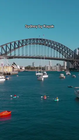 POV: Ticking off bucket-list moments around Sydney's iconic harbour ✔️ @Christine Balaguer ( Deaf ) joined us for an unforgettable day in Warrane (@Sydney) hitting up some of the city's AUSLAN-interpreted experiences, and we're pretty sure these scenes will have you *officially* craving a day on #SydneyHarbour 😍 Soak in picture-perfect views from the water during a paddle with @Sydney By Kayak | Kayak Tours, scale to new heights with #BridgeClimb and marvel at world-famous architecture on a tour with @Sydney Opera House for the ultimate day in our beautiful city ❤️  📍: Tubowgule (Sydney Harbour), Warrane (#Sydney), @New South Wales  #SeeAustralia#SeeAustraliaday #FeelNSW #FeelNewSydney  ID: Aerial view over a ferry travelling through a blue harbour, followed by a series of scenes showing a person joining AUSLAN-guided experiences, including climbing a large arched bridge, exploring an opera house adorned in white sails and kayaking on the tranquil harbour.