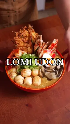 🇵🇭🇯🇵 Lomi Udon  Is there anything more comforting than a hot bowl of Lomi this rainy season? I wanted to experiment with my own version, by adding a few Japanese elements to the dish and of course some Maggi Magic Chicken Cube to really round out the flavor. I was really quite pleased with the outcome and highly recommend this for anyone looking for something warm and comforting.  Really, helps dislodge some of that phlegm and make me feel better all-year round! And grabe, noknokan talaga sa sarap! INGREDIENTS:  Stock: - 200g shrimps, peeled and deveined - 200g clams - 3 crabs - 2 stalks leeks - Kombu kelp - 8 dry Shiitake Mushrooms - ½ cup of mirin - ¼ cup fish sauce - 1 cup water Soup: - Chicken oil for cooking - 1 onion, sliced - 1 garlic bulb, minced - 1 Maggi Chicken Cube - cornstarch slurry - 1 whole napa cabbage,sliced - 1 carrot, sliced - 3 beaten eggs - Pepper to taste Kakiage: - 1 small squash, sliced - 1 bundle enoki mushrooms - 1 carrot, sliced - ⅓ cup tempura flour - 1 sachet Maggi Magic Sarap - ½ cup tempura flour w/ egg and water Other Toppings: - 1 Soft Boiled Egg - Fishballs - Onion leeks INSTRUCTIONS: - In a hot pan with oil, add your shrimp peels along with crabs, clams, onion leeks, kombu kelp, water, mirin, shiitake mushrooms, and fish sauce. Boil before bringing it to a simmer for at least 20 minutes. Strain stock afterwards. - Cook onions and garlic in chicken oil, and add the stock you just made. Add 1 Maggi Magic Chicken Cube, to add more depth in the flavoring, before adding a cornstarch slurry to thicken. - Add your chopped vegetables and some beaten eggs.  - To make your kakiage, add in a bowl your chopped vegetables along with enoki mushrooms. Tempura flour to coat, 1 Sachet of Maggi Magic Sarap, and water and flour mixture. Mix well until combined and fry at 165C until golen brown and crispy.  - Add cooked udon noodles inside a bowl and ladle on soup.Top with the seafood saved from making the stock along w/  fish balls, kakiage, and a jammy egg and top it off with some sliced onion leeks. Serve and enjoy! #MaggiMadeMeDoIt #Cookingasmr #asmr