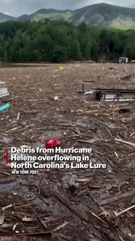 Historic flooding in North Carolina from Hurricane Helene left Lake Lure filled with debris.