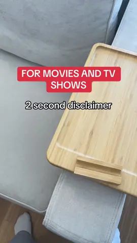 The perfect bamboo arm tray table for someone who loves watching movies and tv shows from home! #giftfromTikTokShop #sofaarmtray 