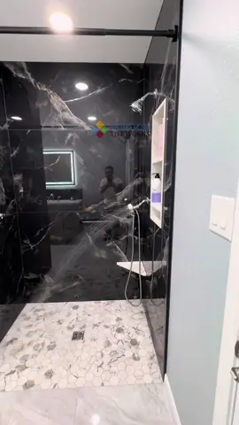 Bathroom Remodel with a Curb-less Shower #turnkey #bathroom #blacktile #largeblacktile #modernbathroom #curblessshower #tilecontractor #handicapped 