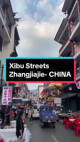 enjoy the afternoon with snacks and stunning city views 😍 At Xibu Streets, Zhangjiajie - China 📍 #china #zhangjiajie #guangzhou #holiday #vacation #travel #hunan #goodvibes 