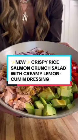 ✨NEW✨ CRISPY RICE SALMON CRUNCH SALAD WITH CREAMY LEMON-CUMIN DRESSING By now you guys know my crispy rice salad obsession is REAL. I keep making them bc I can't get enough of the different textures and flavor combos, and in case you didn't know, I eat the food I food I film-so here you go, my FAVORITE! Makes 4 large servings or 6 smaller Crispy Rice 2 cups cooked rice, cooled (I used jasmine rice) 2 tsp soy sauce 2 tb chili crisp/crunch (Trader Joe's makes a good one, I used Momofuku this time!) 1 tb sesame oil Salmon 8oz salmon Pinch cumin, salt & pepper Salad 5 Persian cucumbers, thinly sliced (or 1 large English cucumber) 1 red bell pepper, diced small 1 small red onion, finely sliced 1 avocado, diced Creamy Lemon-Cumin Dressing 1/2 cup olive oil 1/4 cup lemon juice (1-2 lemons) 2 to honey 1 large shallot, roughly chopped 1/2 tsp cumin 1 tsp kosher salt 1/2 tsp ground black pepper First, prepare the crispy rice topping. Preheat oven to 400F. Line a baking sheet with parchment paper. Add cooked and cooled rice to the baking sheet. Toss well with the soy sauce, chili crisp and sesame oil. Bake for 30-35 minutes, tossing half way through (just watch to make sure it doesn't burn). While the rice is in the oven, season salmon and place it on a baking sheet. Add to the oven (with the crispy rice) and let bake for 13-14 minutes, or until desired doneness. Remove the rice from the oven and set aside. Remove the salmon tray from the oven, shred into smaller pieces and set aside. Next, chop/slice all of the ingredients for the salad and add to a large bowl. Add the shredded salmon and crispy rice on top. Last, make the dressing. Blend to together all of the ingredients for the dressing until smooth & creamy. Taste and adjust seasonings as needed. Pour dressing over the salad. Toss and enjoy! #salad #saladrecipes #crispyrice #crispyricesalad #salmon