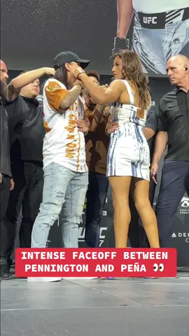 An INTENSE face-off between the current and former #UFC women's bantamweight #champion 👀 #UFC307 #combatsports #JuliannaPena #RaquelPennington 