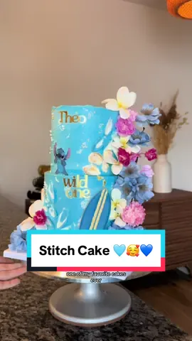 This was almost a disaster 🥹🩵🤠💙🫶✨ What do you think about fake cake tiers‽ #cakedecorating #stitchcake #liloansstitchcake #firstbirthdaycake #fakecakes #wildonebirthdaycake 
