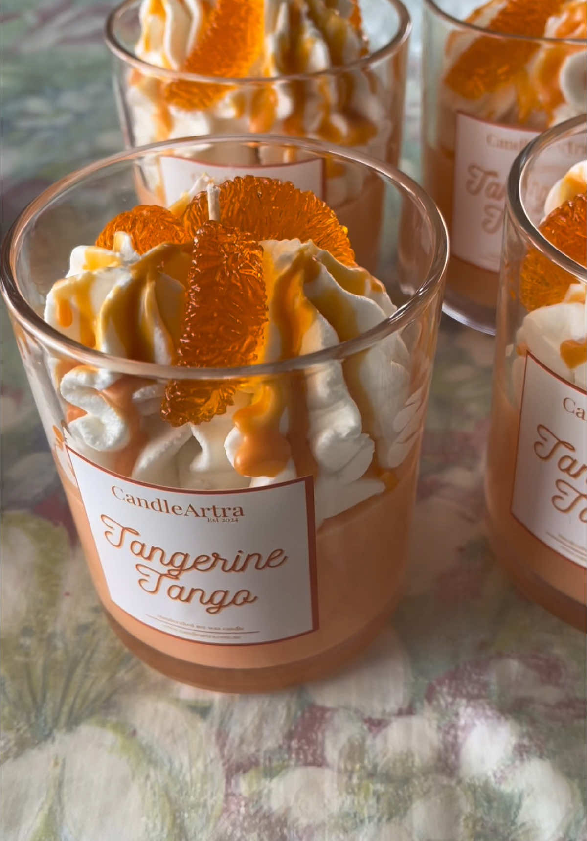 Tangerine Tango you smell devine!  Love the white whip on this one. The gel segments are too fun, can’t resist, I just have to give them a squish!  . . . #dessertcandles #tangerine🍊 #candles #restock #gelwax #candleartra #perthaustralia #homedecor 
