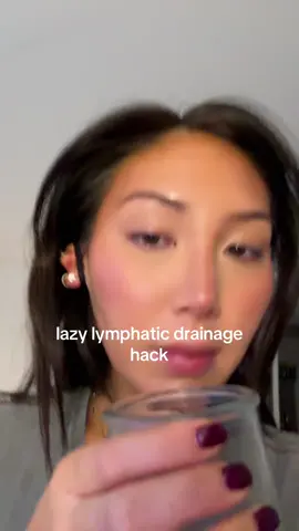 k beauty tip it looks weird but it works do it for 10 mins on your ears #lymphaticdrainage 